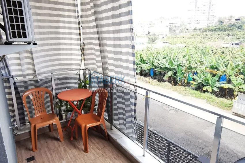 Приобрести Квартира 1+1 с новой мебелью и видом на горы в Алании район Махмутлар 19 