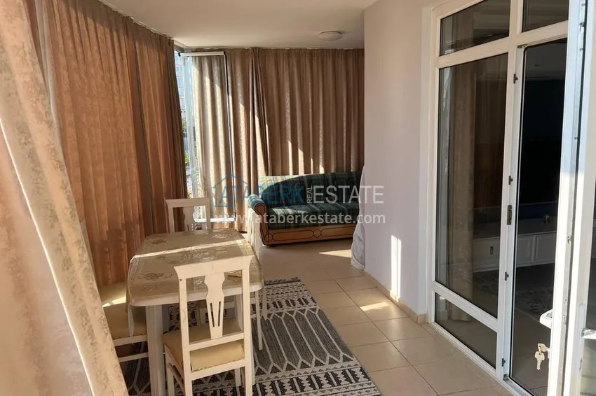 Приобрести Квартира 2+1 с мебелью и застекленными балконами в районе Алании открытом для ВНЖ - Джикджилли 20 