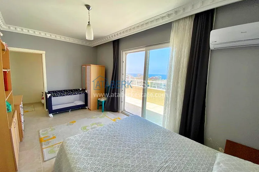 Приобрести Пентхаус-дуплекс 3+1 в Махмутларе с мебелью, застекленным балконом и видом на море 19 