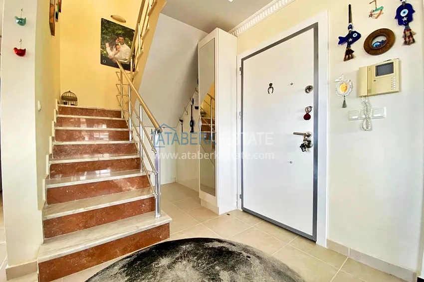 Приобрести Пентхаус-дуплекс 3+1 в Махмутларе с мебелью, застекленным балконом и видом на море 1 