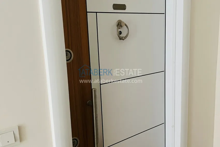 Приобрести Просторная двухкомнатная квартира с тремя застеклёнными балконами в Алании, район Махмутлар 1 