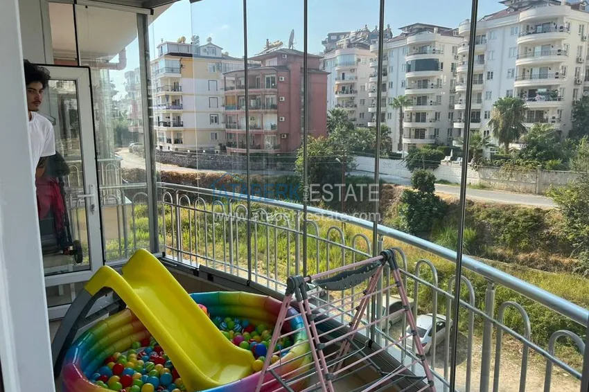 Приобрести Квартира 2+1 с мебелью и застекленными балконами в районе Алании открытом для ВНЖ - Джикджилли 22 