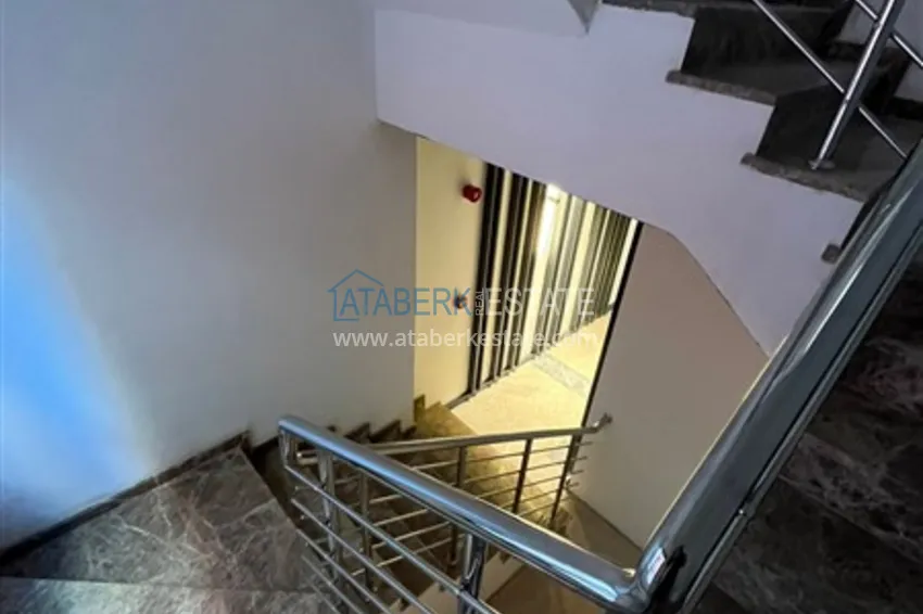 Квартира 1+1 в новом комплексе сегмента премиум на первой береговой линии в районе Оба 22 