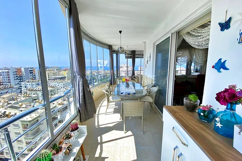 Приобрести Пентхаус-дуплекс 3+1 в Махмутларе с мебелью, застекленным балконом и видом на море 24 