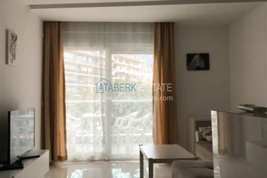 Приобрести Квартира 1+1 меблированная с видом на горы, центр Алании район пляжа Клеопатра 2 