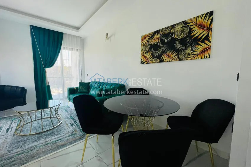 Приобрести Квартира 1+1 в Махмутларе с новой мебелью в молодом комплексе 2 