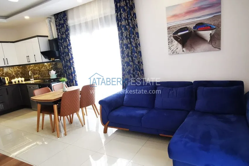 Приобрести Квартира 1+1 с новой мебелью и видом на горы в Алании район Махмутлар 2 