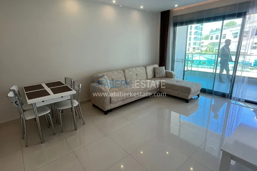 Приобрести Квартира 1+1 с боковым видом на море в элитном комплексе с частным пляжем, Каргыджак – Алания 3 