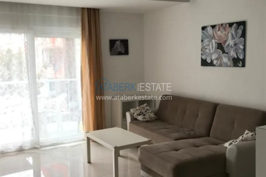 Приобрести Квартира 1+1 меблированная с видом на горы, центр Алании район пляжа Клеопатра 3 