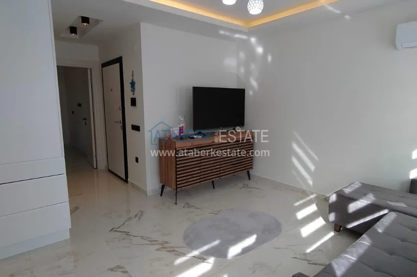 Приобрести Двухкомнатная квартира с мебелью в центре Алании – 700 м от пляжа  3 