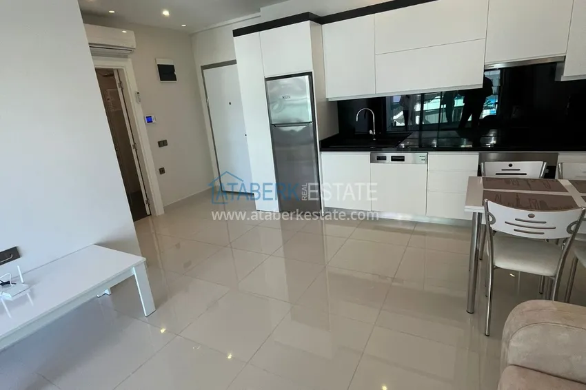 Приобрести Квартира 1+1 с боковым видом на море в элитном комплексе с частным пляжем, Каргыджак – Алания 4 