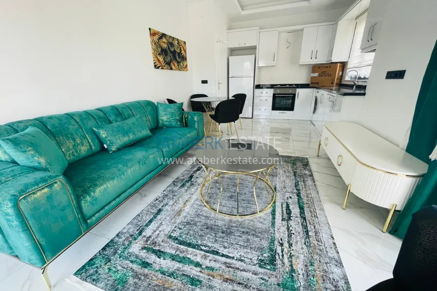 Приобрести Квартира 1+1 в Махмутларе с новой мебелью в молодом комплексе 3 