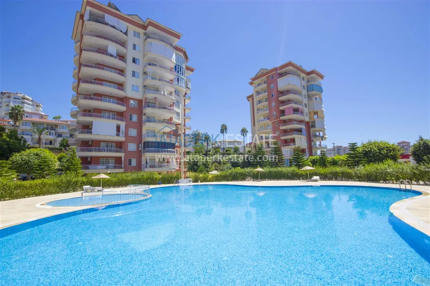 Квартира 2+1 с мебелью и застекленными балконами в районе Алании открытом для ВНЖ - Джикджилли 3 