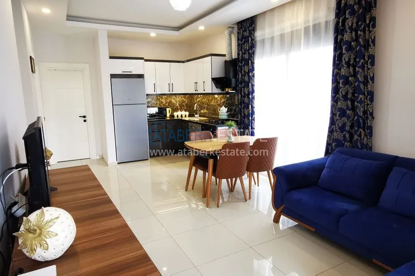 Приобрести Квартира 1+1 с новой мебелью и видом на горы в Алании район Махмутлар 3 