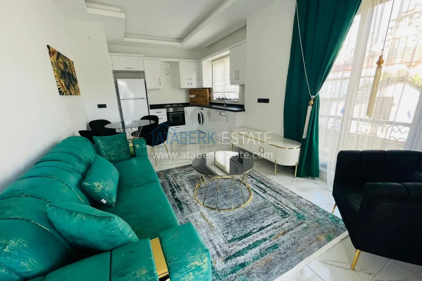 Приобрести Квартира 1+1 в Махмутларе с новой мебелью в молодом комплексе 4 