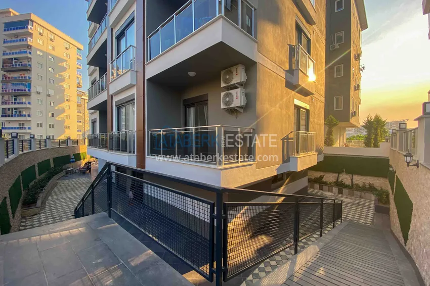 Квартира 1+1 с новой мебелью и видом на горы в Алании район Махмутлар 4 