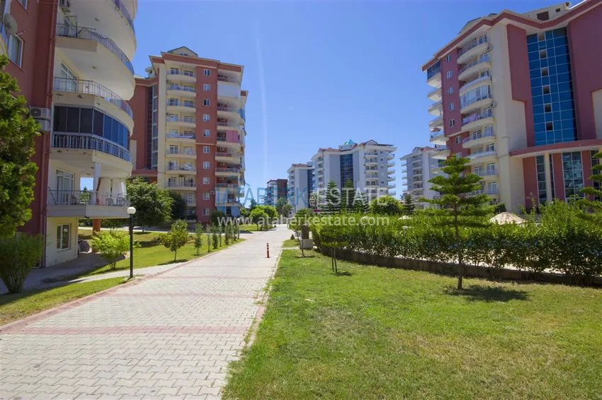 Квартира 2+1 с мебелью и застекленными балконами в районе Алании открытом для ВНЖ - Джикджилли 4 