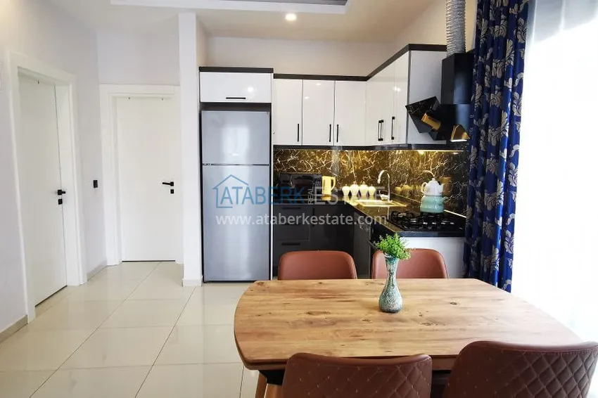 Приобрести Квартира 1+1 с новой мебелью и видом на горы в Алании район Махмутлар 4 