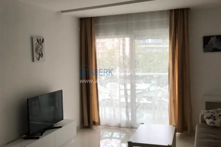 Приобрести Квартира 1+1 меблированная с видом на горы, центр Алании район пляжа Клеопатра 4 