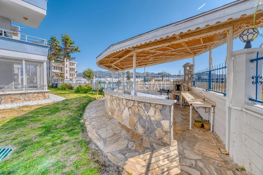 Квартира с дизайнерским интерьером в 200 метрах от моря в районе Алании открытом для ВНЖ - Демирташ 6 