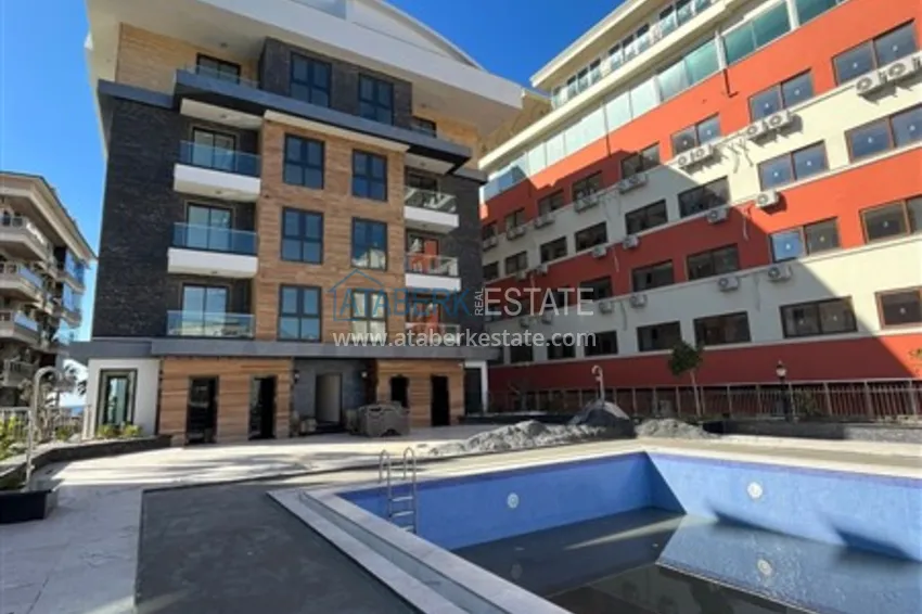 Квартира 1+1 в новом комплексе сегмента премиум на первой береговой линии в районе Оба 5 