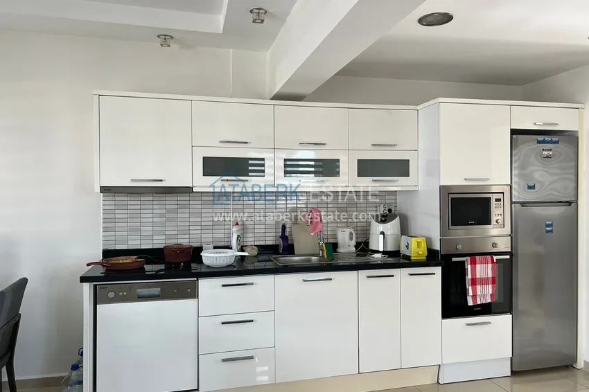 Приобрести Огромная двухкомнатная квартира с мебелью в центре Алании, район пляжа Клеопатра 5 