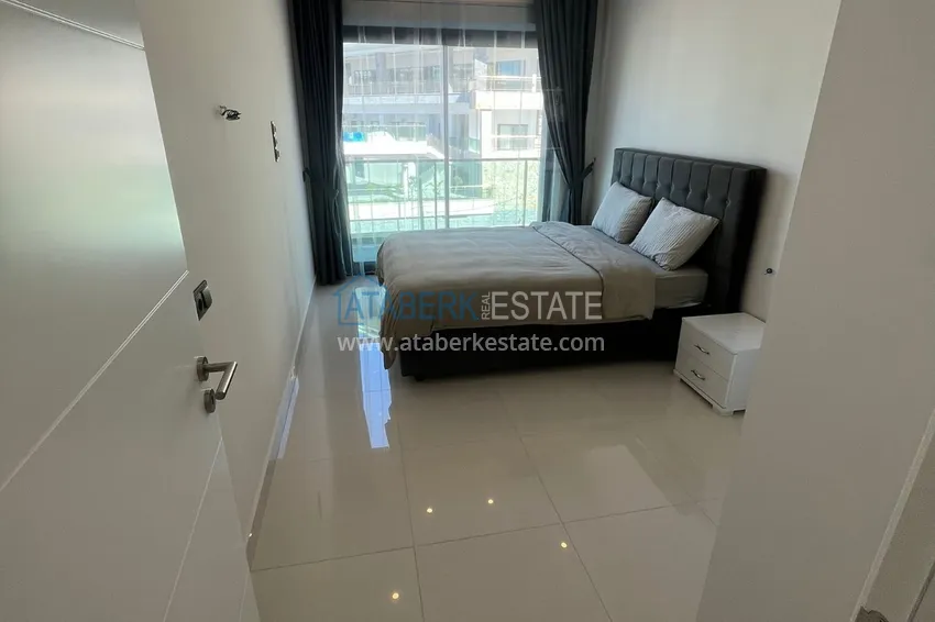 Приобрести Квартира 1+1 с боковым видом на море в элитном комплексе с частным пляжем, Каргыджак – Алания 6 