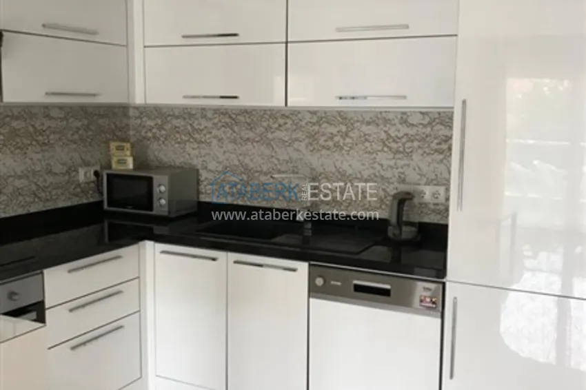 Приобрести Квартира 1+1 меблированная с видом на горы, центр Алании район пляжа Клеопатра 5 