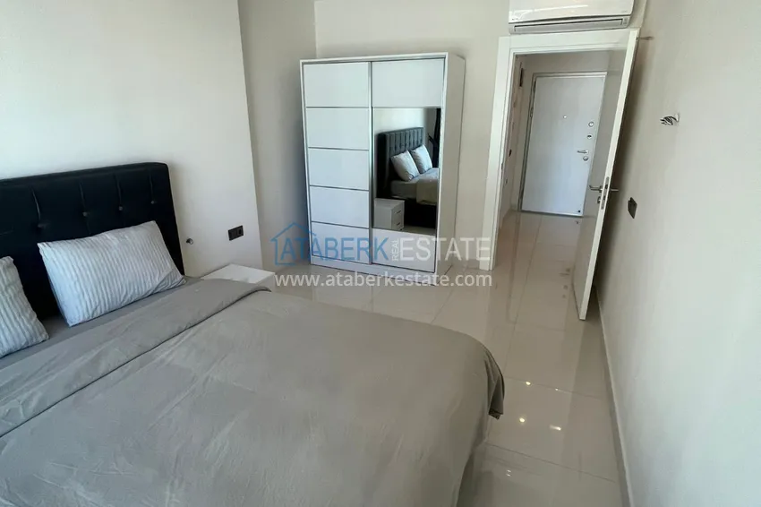 Приобрести Квартира 1+1 с боковым видом на море в элитном комплексе с частным пляжем, Каргыджак – Алания 7 