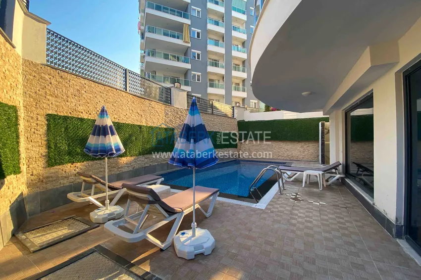 Квартира 1+1 с новой мебелью и видом на горы в Алании район Махмутлар 7 