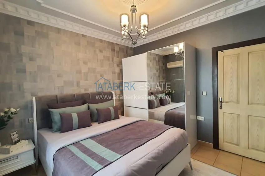 Приобрести Квартира 2+1 в центре Алании с новой современной мебелью и открытым видом из окна. Недвижимость подходит для ВНЖ 9 