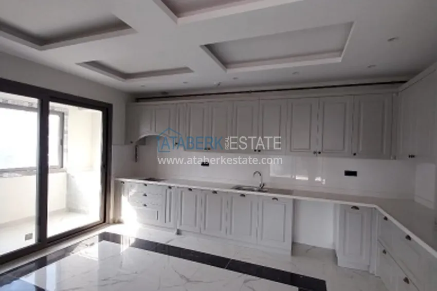 Приобрести Квартиры 5+1 с чистовой отделкой от застройщика в Эрдемли-Мерсин. 9 