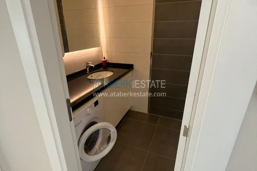 Приобрести Квартира 1+1 с боковым видом на море в элитном комплексе с частным пляжем, Каргыджак – Алания 8 