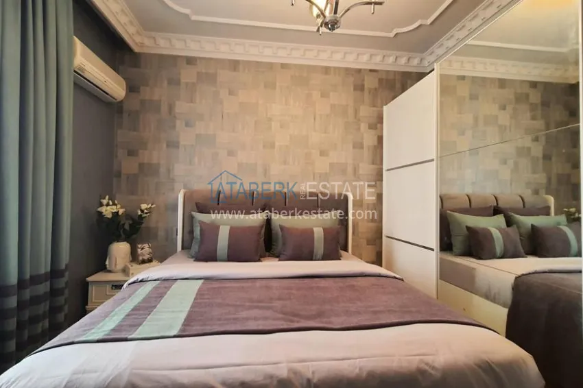 Приобрести Квартира 2+1 в центре Алании с новой современной мебелью и открытым видом из окна. Недвижимость подходит для ВНЖ 10 