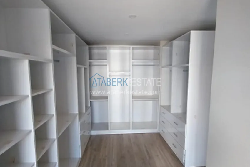 Приобрести Квартиры 5+1 с чистовой отделкой от застройщика в Эрдемли-Мерсин. 12 