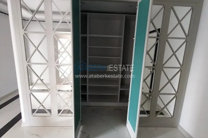 Приобрести Квартиры 5+1 с чистовой отделкой от застройщика в Эрдемли-Мерсин. 8 