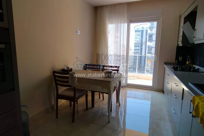 Приобрести Квартира 3+1 частично меблированная с отдельной кухней, район Махмутлар – Алания 8 