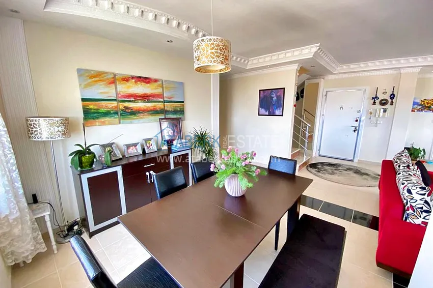 Приобрести Пентхаус-дуплекс 3+1 в Махмутларе с мебелью, застекленным балконом и видом на море 8 