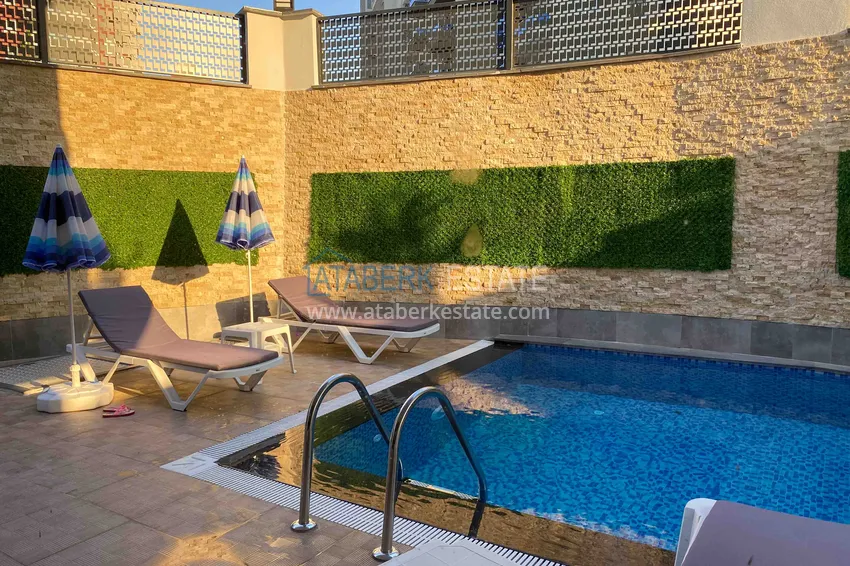 Квартира 1+1 с новой мебелью и видом на горы в Алании район Махмутлар 9 