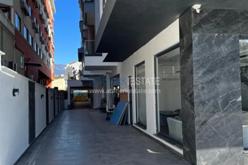 Квартира 1+1 в новом комплексе сегмента премиум на первой береговой линии в районе Оба 8 