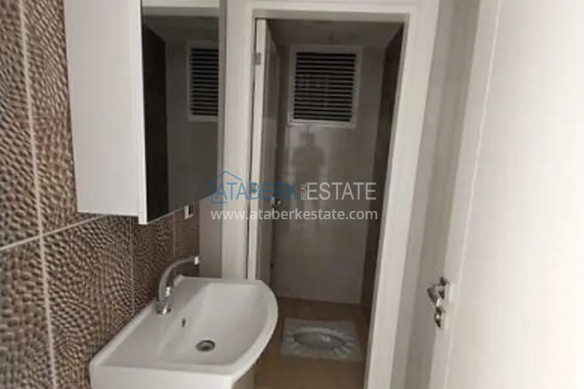 Приобрести Квартиры 4+1 с чистовой отделкой в новостройке в Эрдемли-Мерсин. 17 