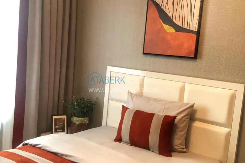 Приобрести Квартира 2+1 в центре Алании с новой современной мебелью и открытым видом из окна. Недвижимость подходит для ВНЖ 12 