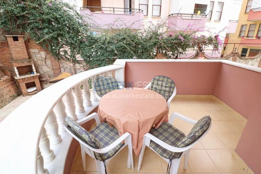 Приобрести Просторная двухкомнатная квартира с мебелью и тремя балконами – центр Алании, Дамлаташ 9 