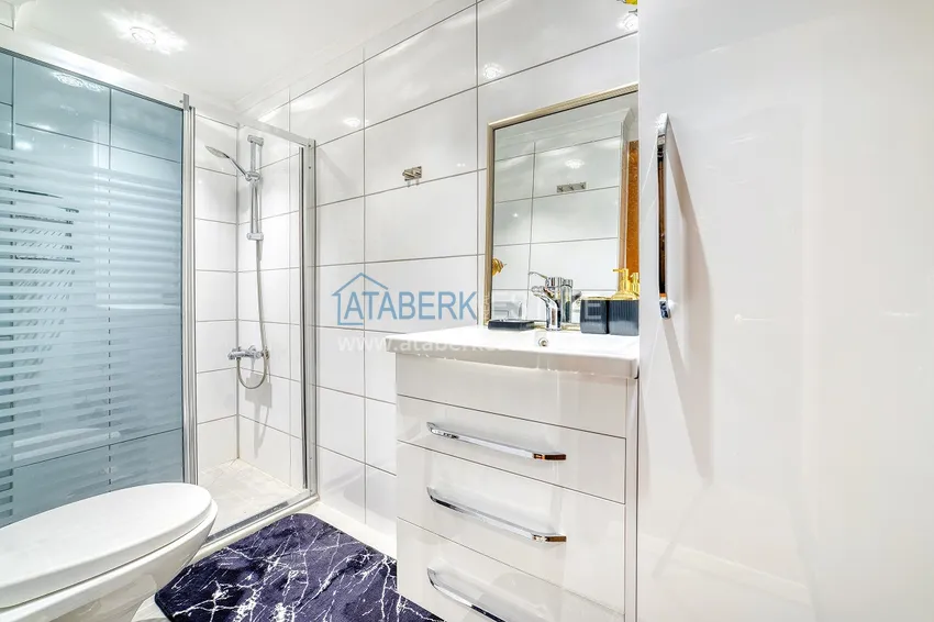 Приобрести Стильная городская квартира с авторским дизайном в 50 метрах от пляжа Кейкубат - центр Алании  9 