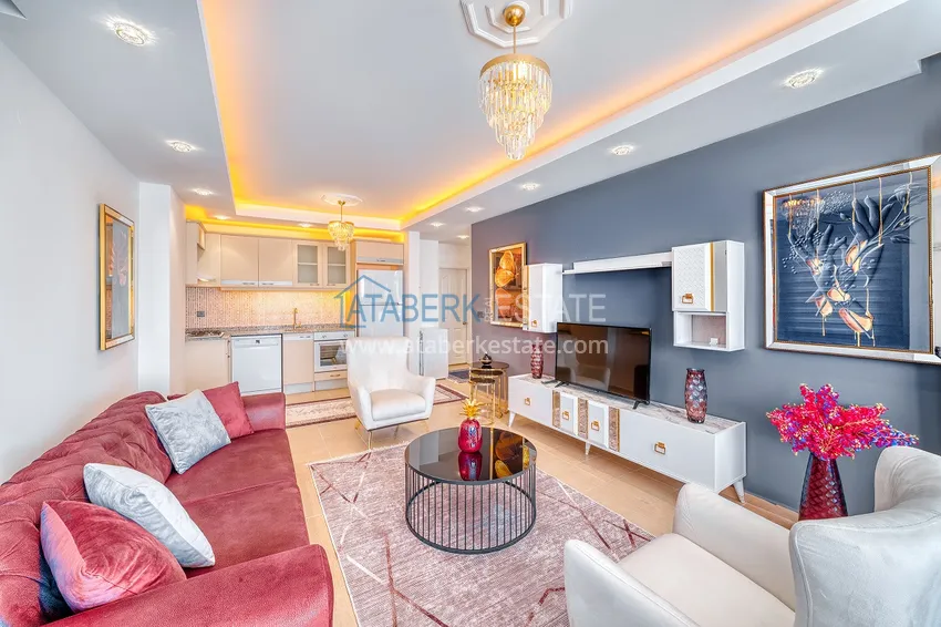 Квартира с дизайнерским интерьером в 200 метрах от моря в районе Алании открытом для ВНЖ - Демирташ 1 