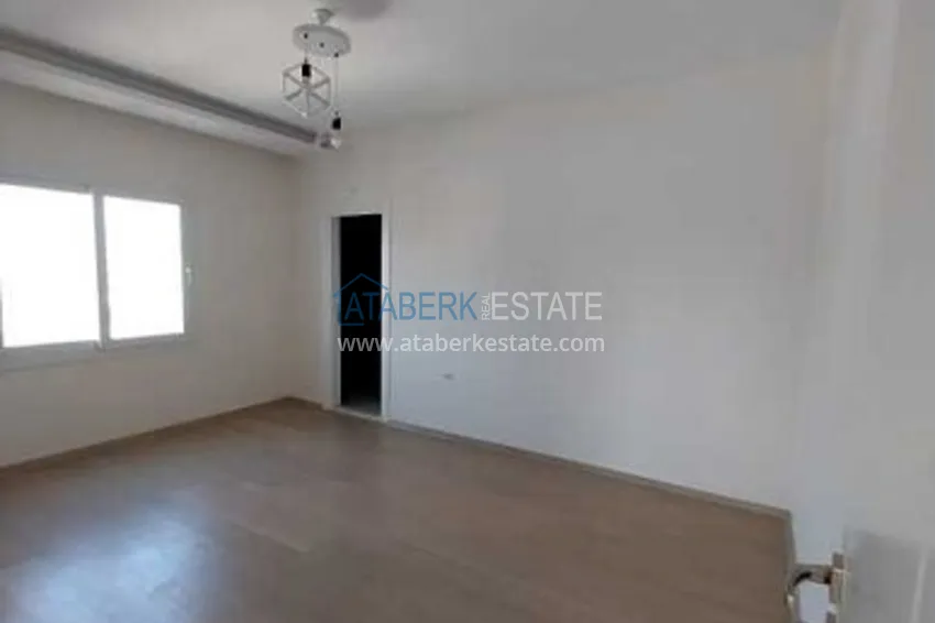 Приобрести Квартиры 4+1 с чистовой отделкой в новостройке в Эрдемли-Мерсин. 12 