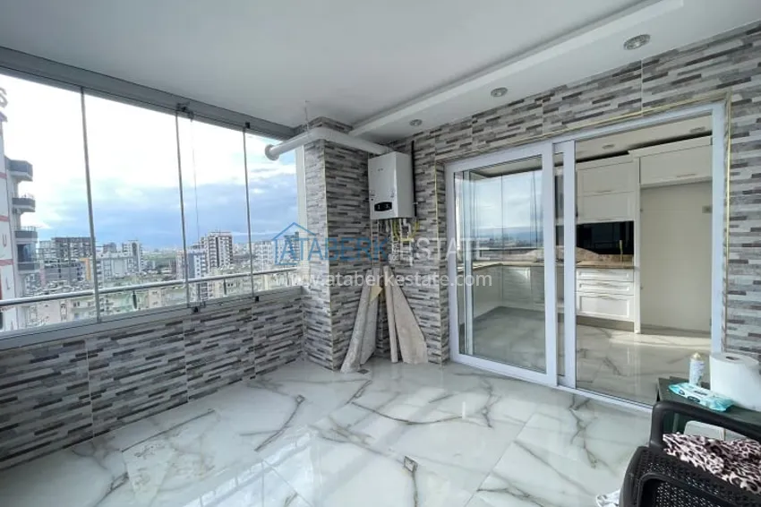 Приобрести Квартира 3+1 с видом на море и горы в районе Тедже-Мерсин 19 