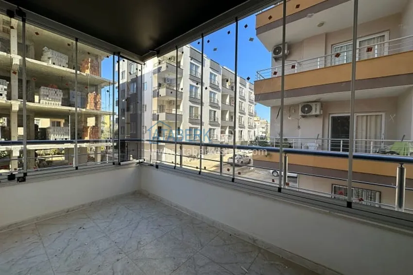 Приобрести Трехкомнатная квартира с застекленным балконом, в районе Эрдемли-Алата 17 