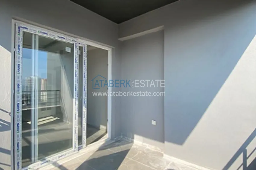 Приобрести Апартаменты 2+1 в новом жилом комплексе, в районе Тедже-Мерсин 21 