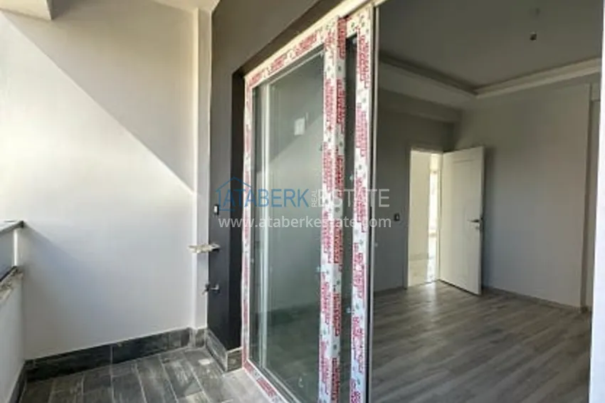 Приобрести Квартира 2+1 с чистовой отделкой, в новом ЖК с инфраструктурой, в районе Арпачбахшиш-Мерсин 17 